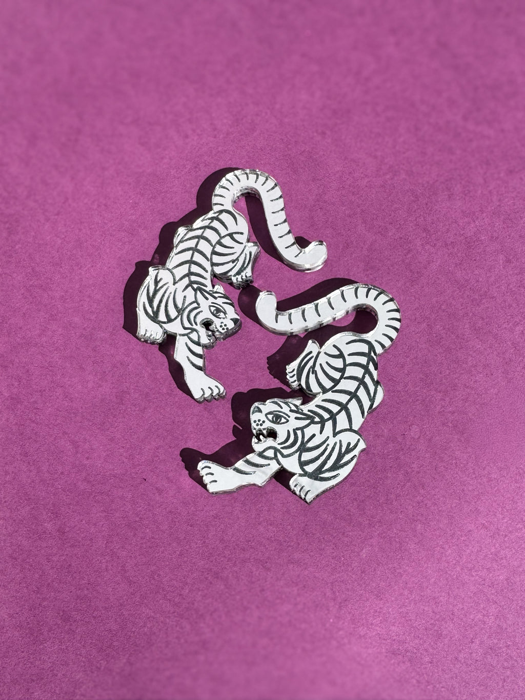 Pesos ligeros Tigre plateados para dilatación — detalle de la pieza